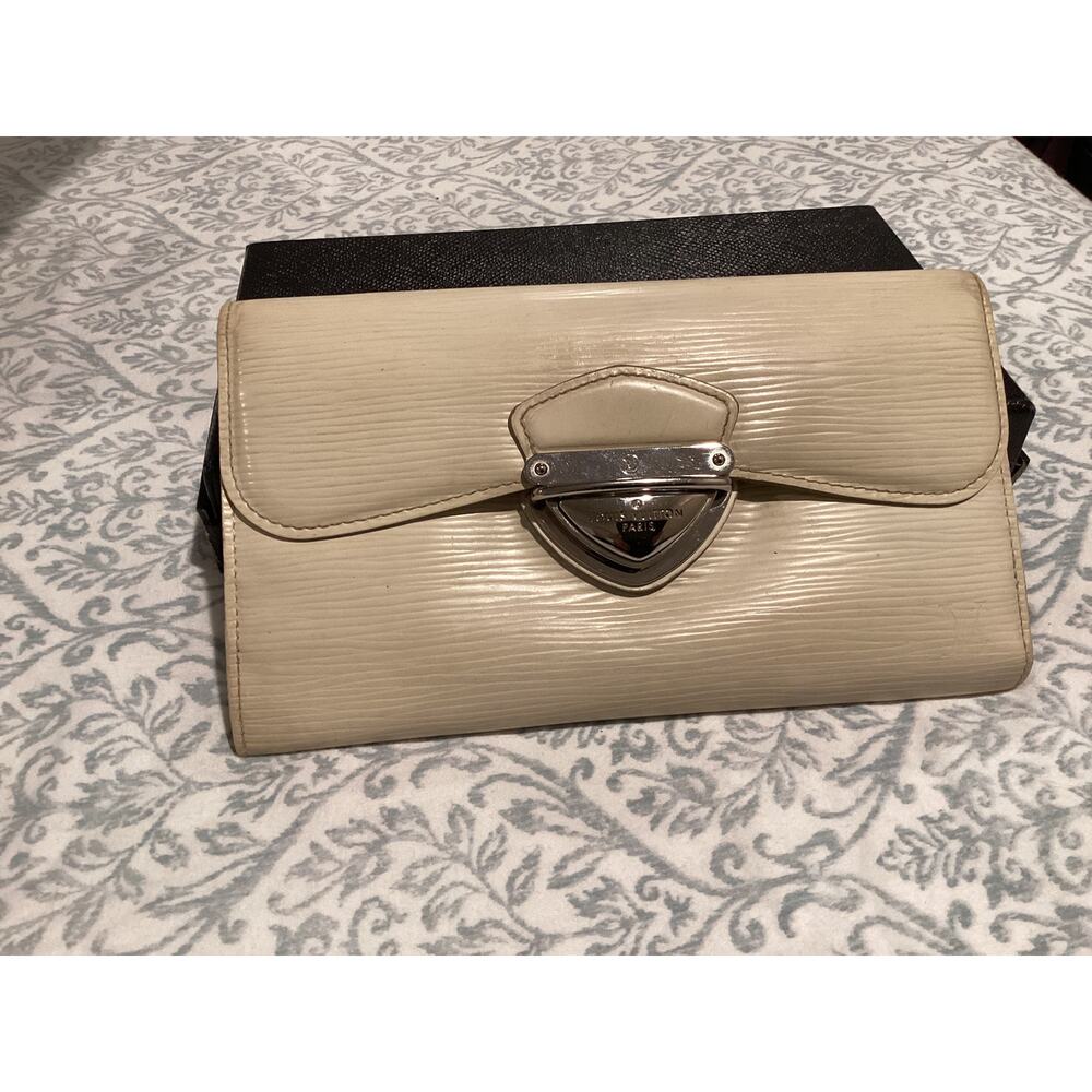 Authentic Louis Vuitton Eugenie Wallet in ivory epi leather